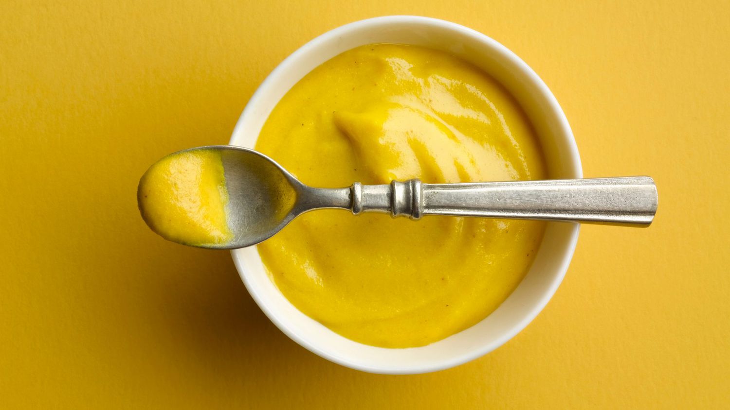 A bowl of fresh mustard.